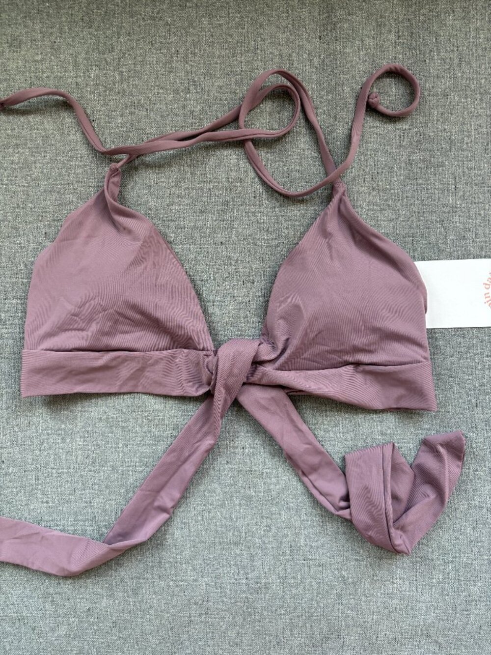 Dippin Dasiys front tie bikini top